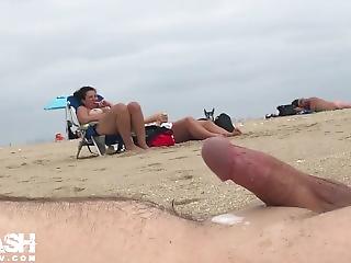 Twink slut masturbate penis on beach